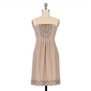 Anthropologie mini strapless dress with embroidery.